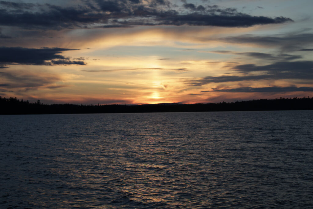 Tranquil sunset over serene lake